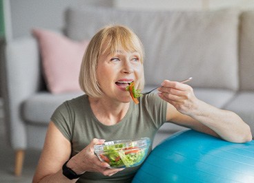 Woman eating a salad