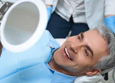 Man smiling with dentures
