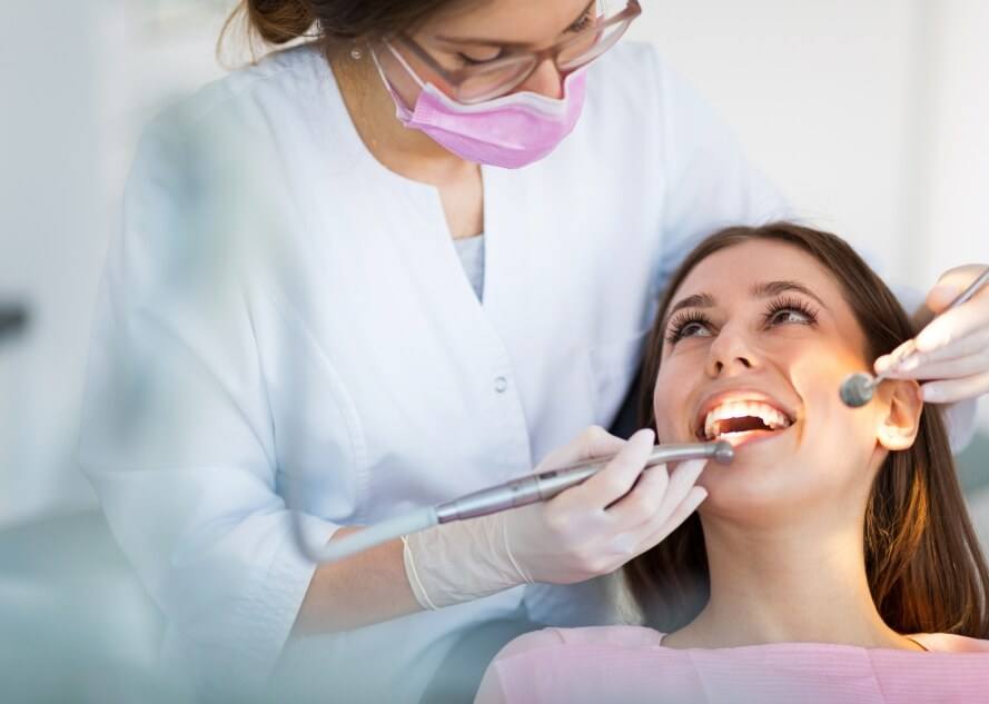 Dentist treating dental patient