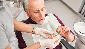 Dental insurance may partially cover your new dentures