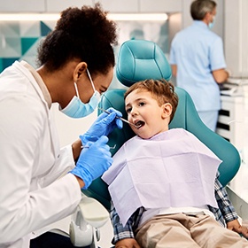 A young girl getting a dental checkup