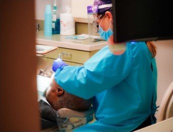 doctor treating patient in Baytown