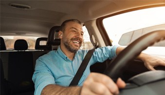 man driving home from dental office 